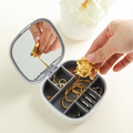 Portable Jewelry Organizer – Compartmentalized Design with Built-in Mirror